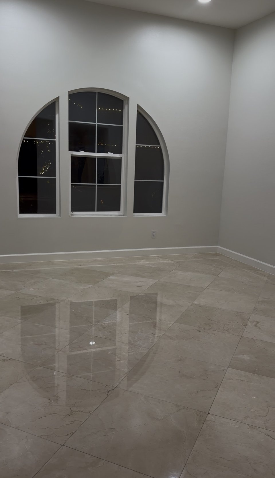 Orange County marble floor polished to a mirror shine after professional restoration
