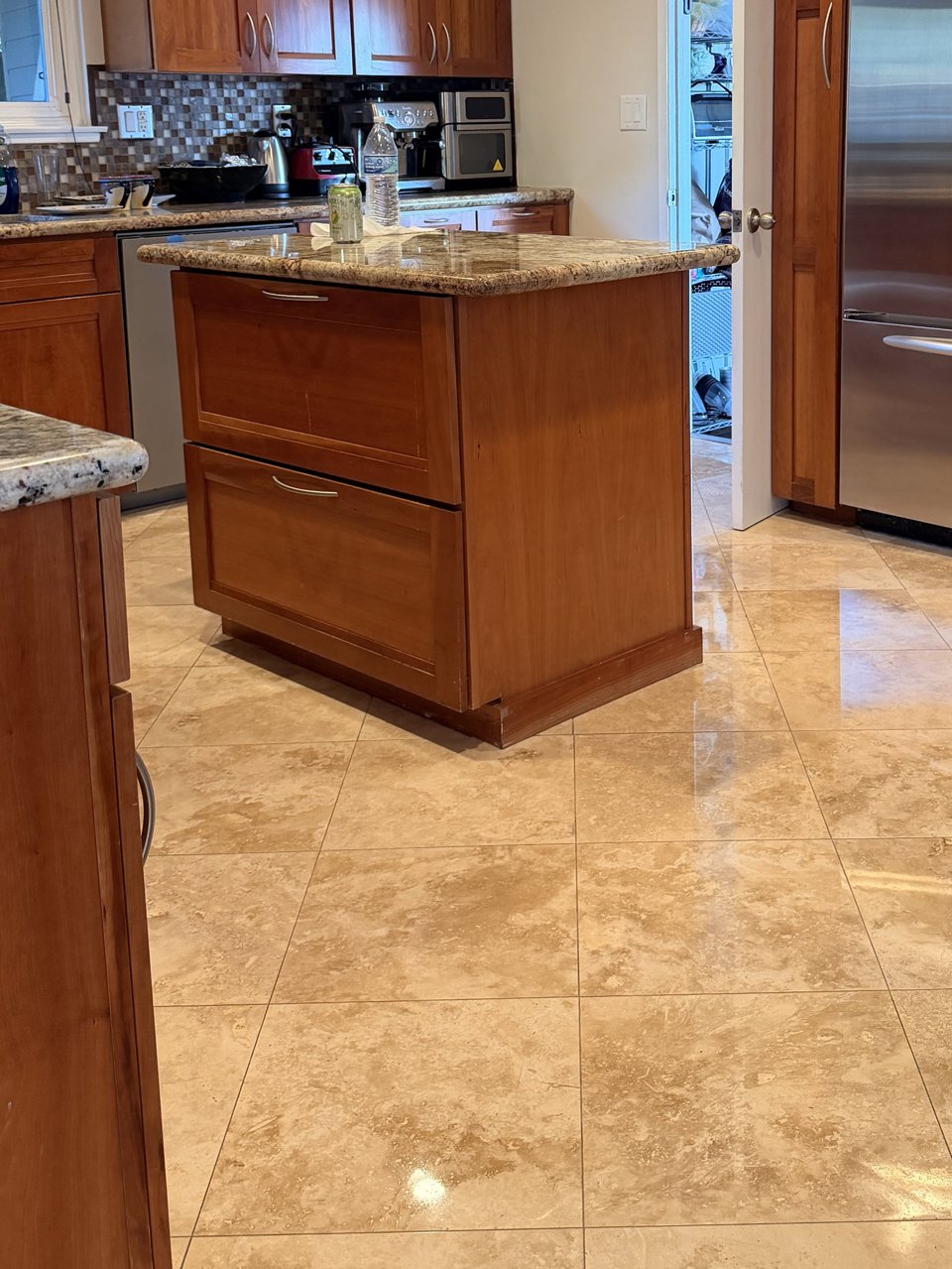 Long Beach kitchen travertine floor after honing, polishing and sealing by Titan Stone Pros