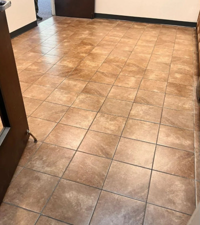 Tile and grout floor before restoration