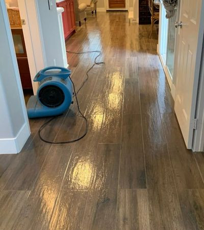 Wood-look tile floor after restoration
