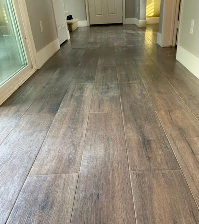 Wood-look tile floor before restoration
