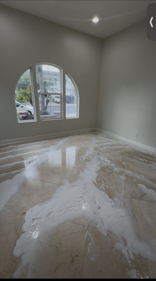 The same marble floor before honing and polishing