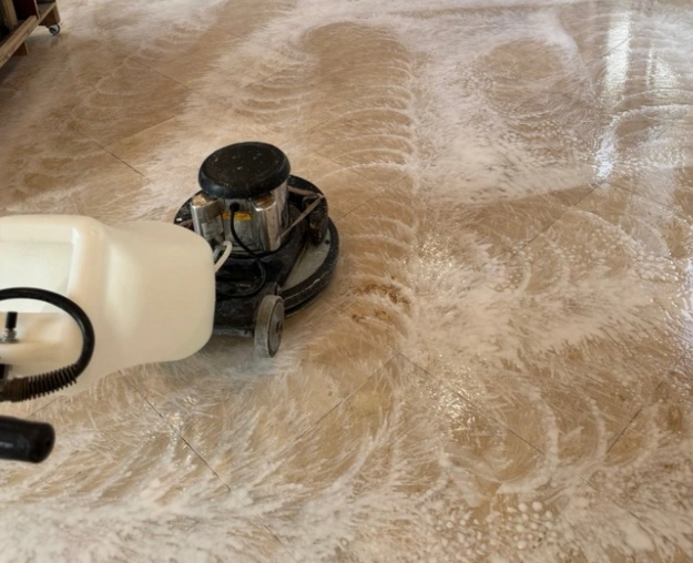 Stone tile floor during cleaning